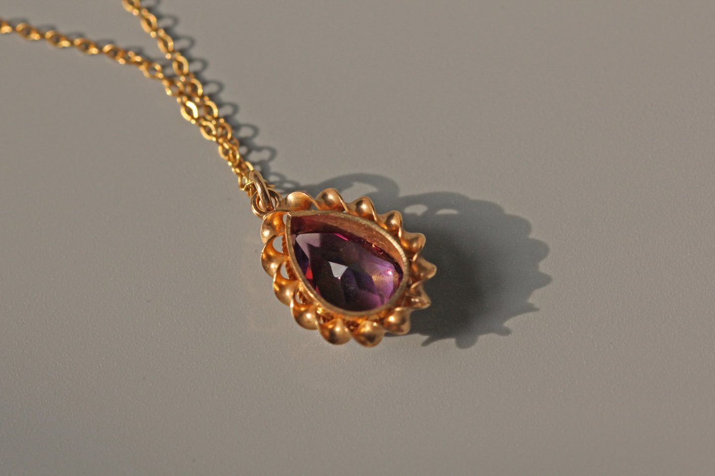 Back view of vintage gold amethyst pendant necklace
