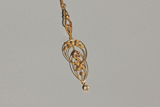 Antique Art Nouveau zircon and seed pearl lavaliere pendant in 9 carat gold on necklace