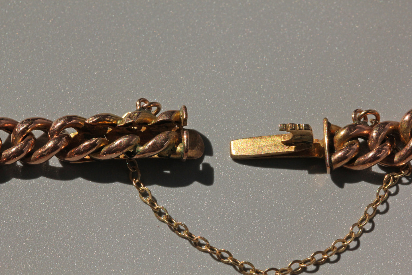 Antique curb link concealed clasp bracelet, in 9 carat gold