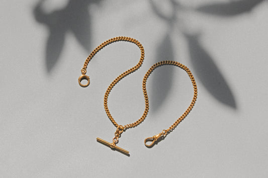 Antique curb link chain with T bar pendant