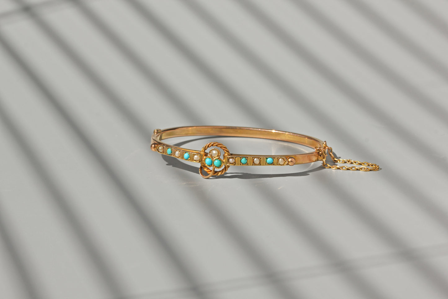 Antique turquoise and pearl ivy or clover bangle, in 9 carat gold