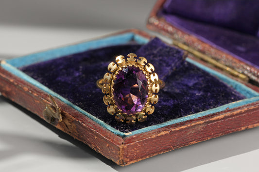 vintage gold ring with huge amethyst gemstone