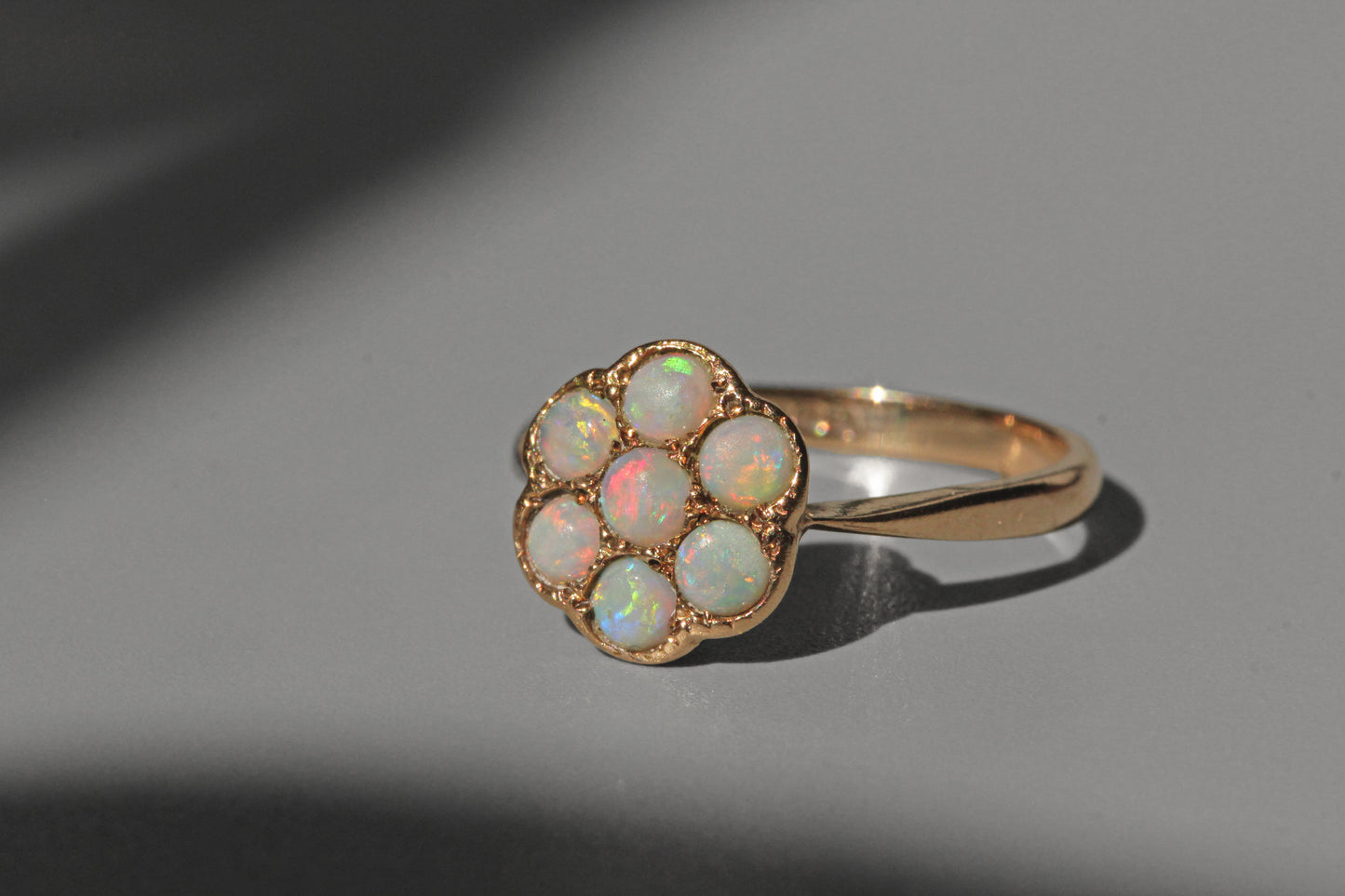 Vintage opal flower cluster ring, in 9 carat gold