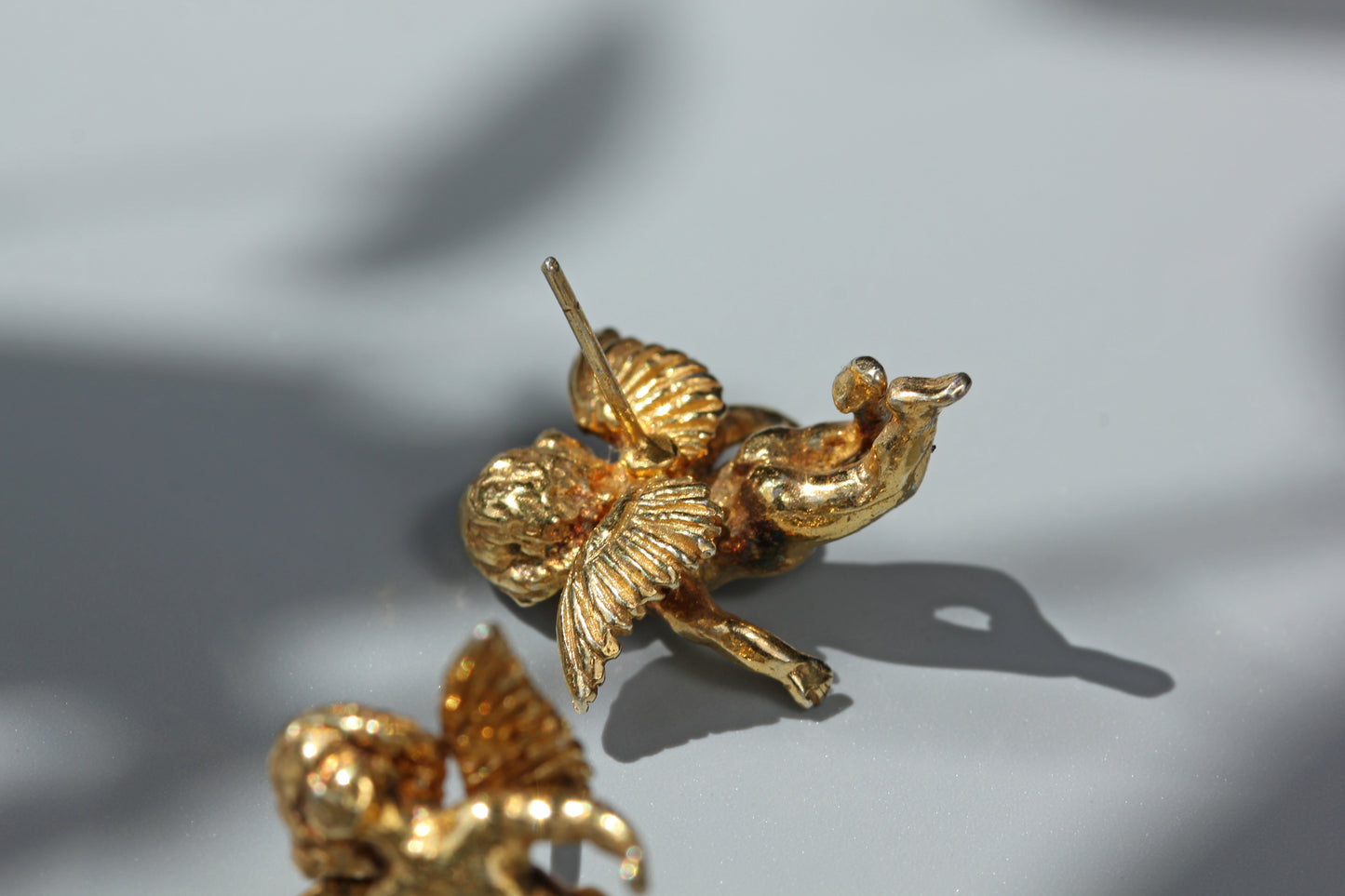 Vintage renaissance cherub stud earrings, in silver gilt