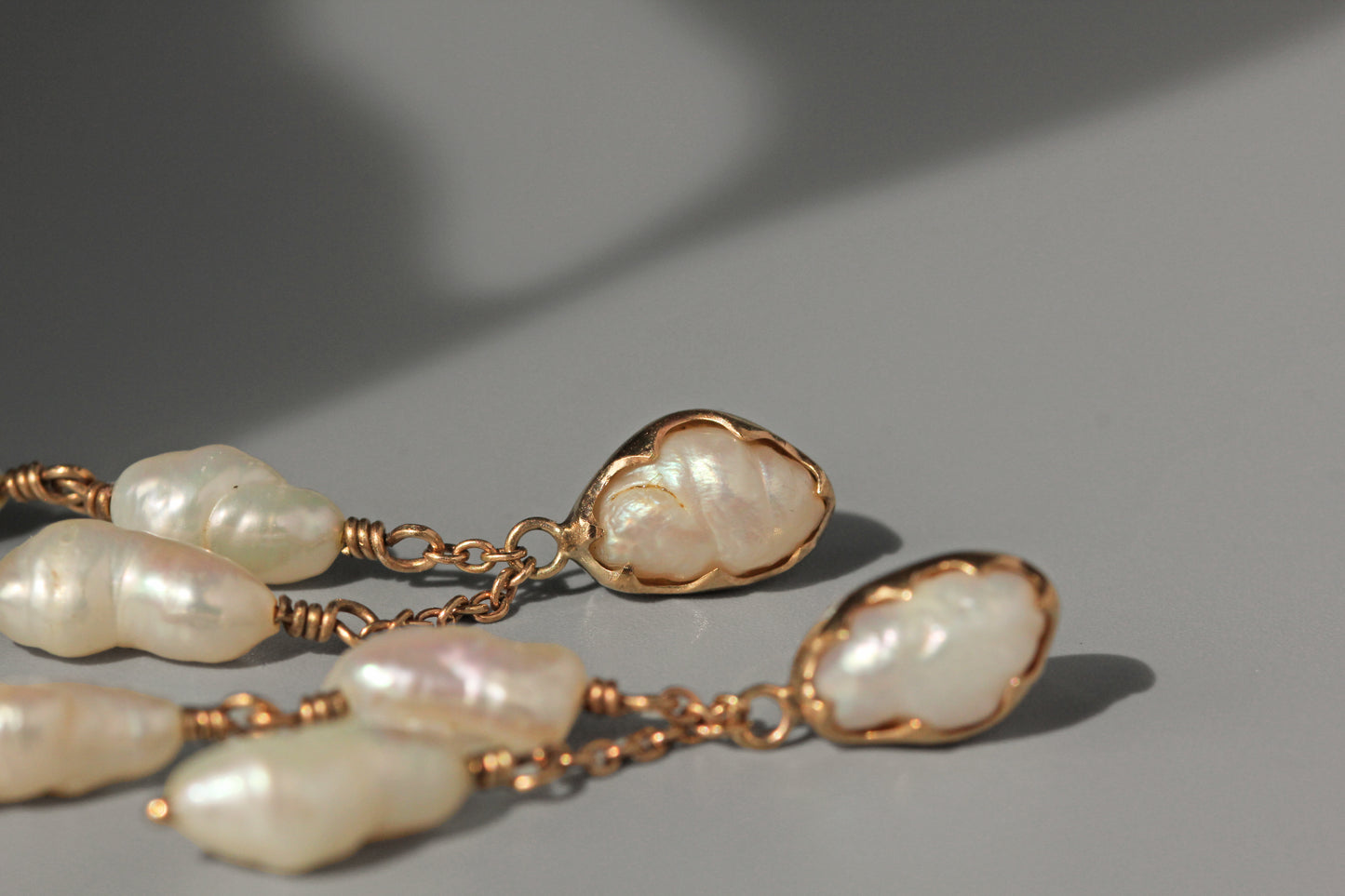 Antique baroque pearl drop earrings, in 9 carat gold