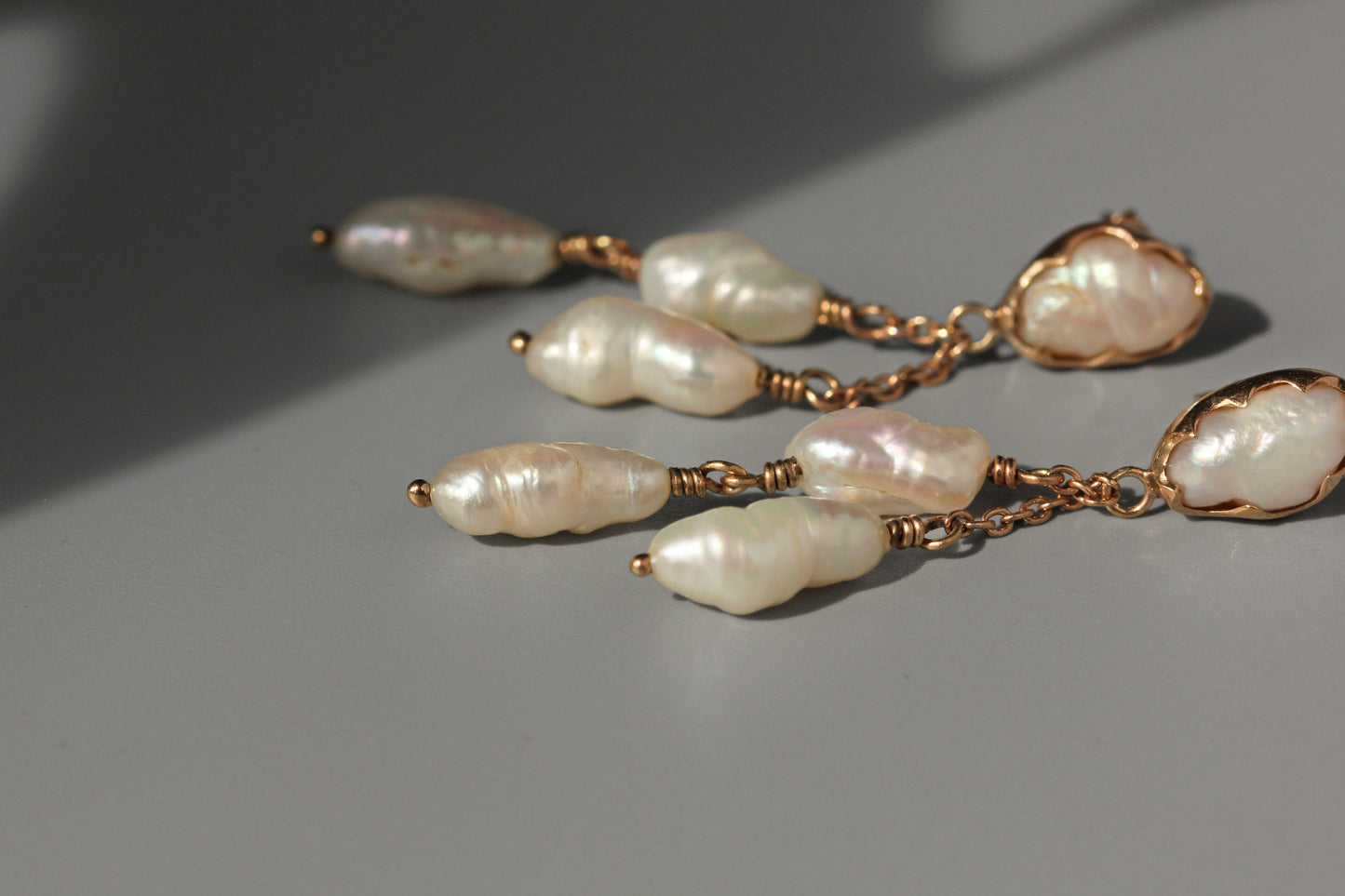 Antique baroque pearl drop earrings, in 9 carat gold