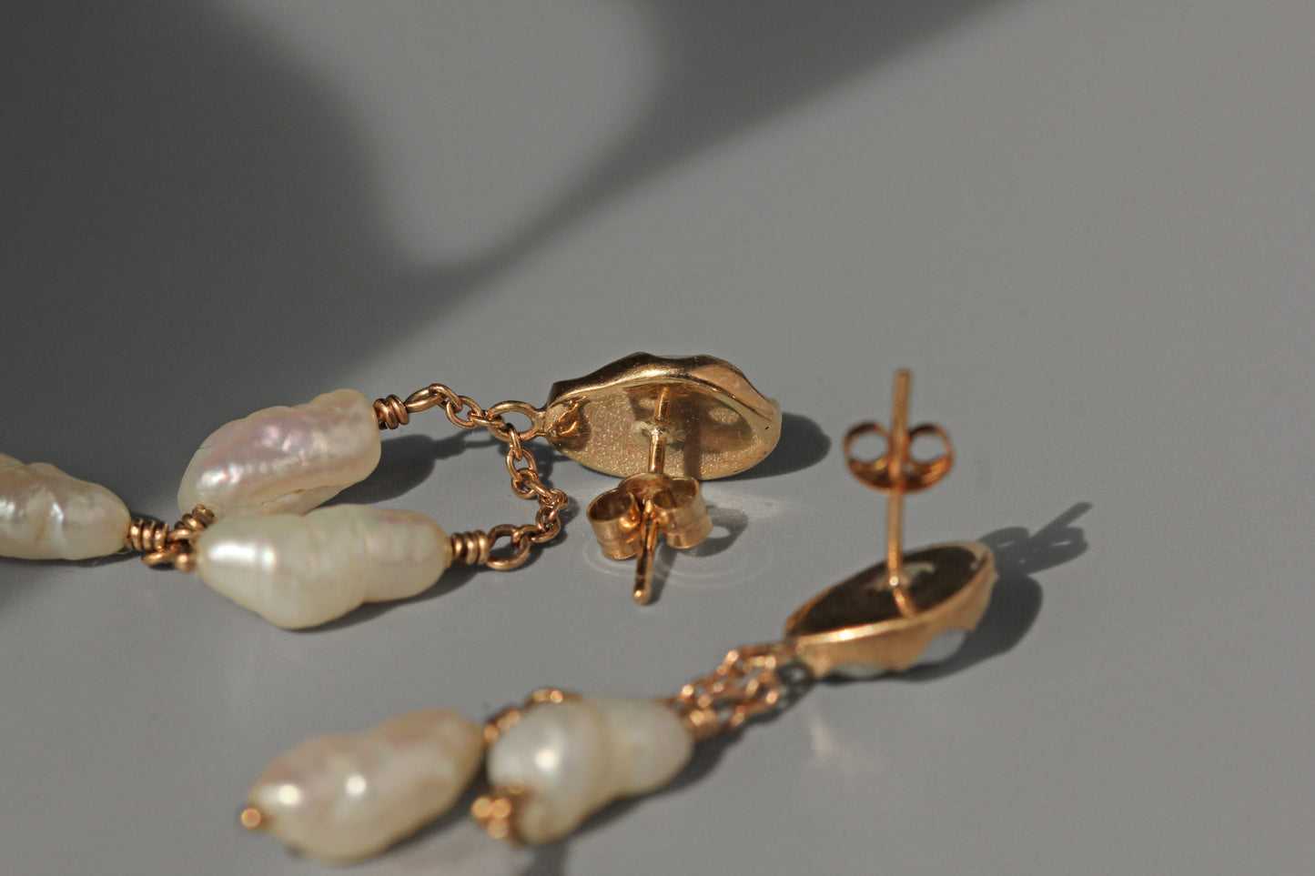 Antique baroque pearl drop earrings, in 9 carat gold