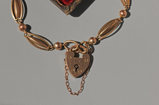 Antique victorian fancy link bracelet with heart padlock, in 9 carat gold