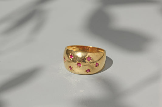 Vintage chunky celestial star set ruby ring, in 18 carat gold