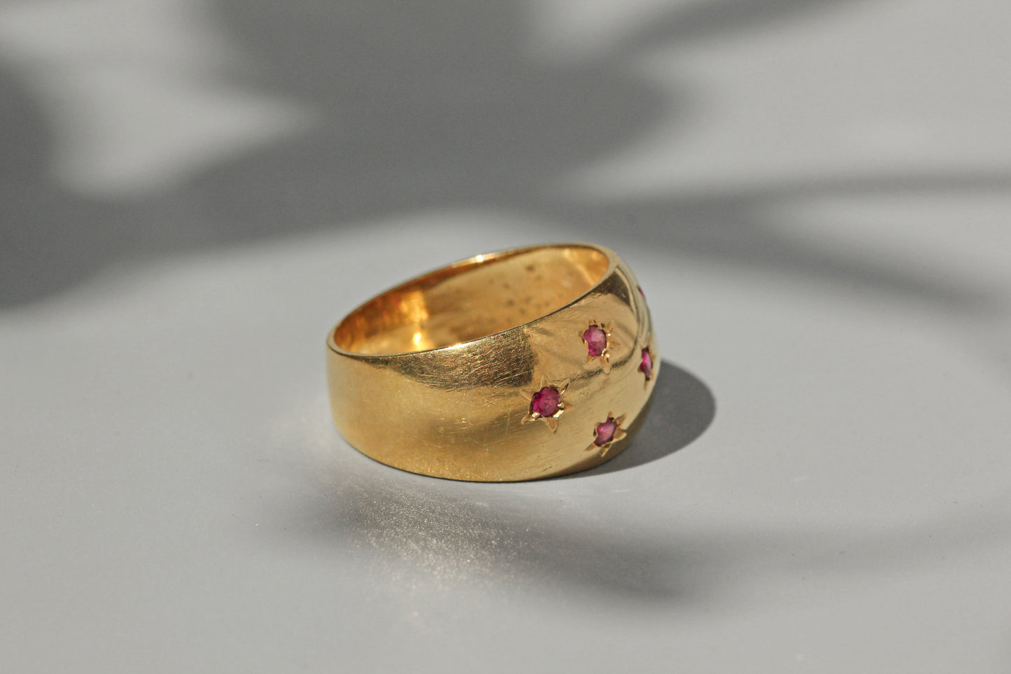 Vintage chunky celestial star set ruby ring, in 18 carat gold
