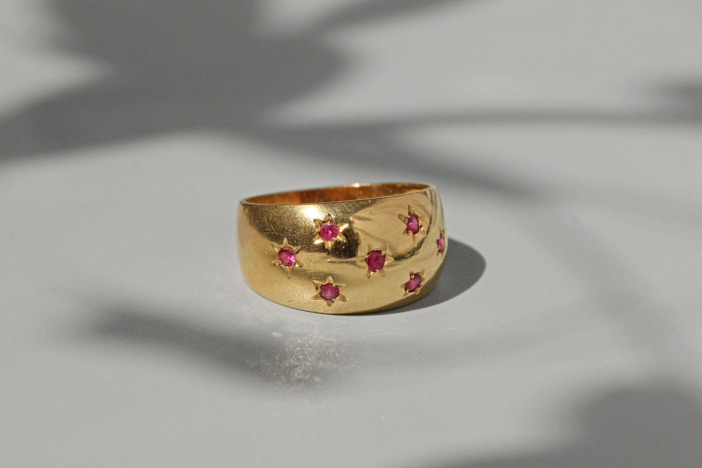Vintage chunky celestial star set ruby ring, in 18 carat gold