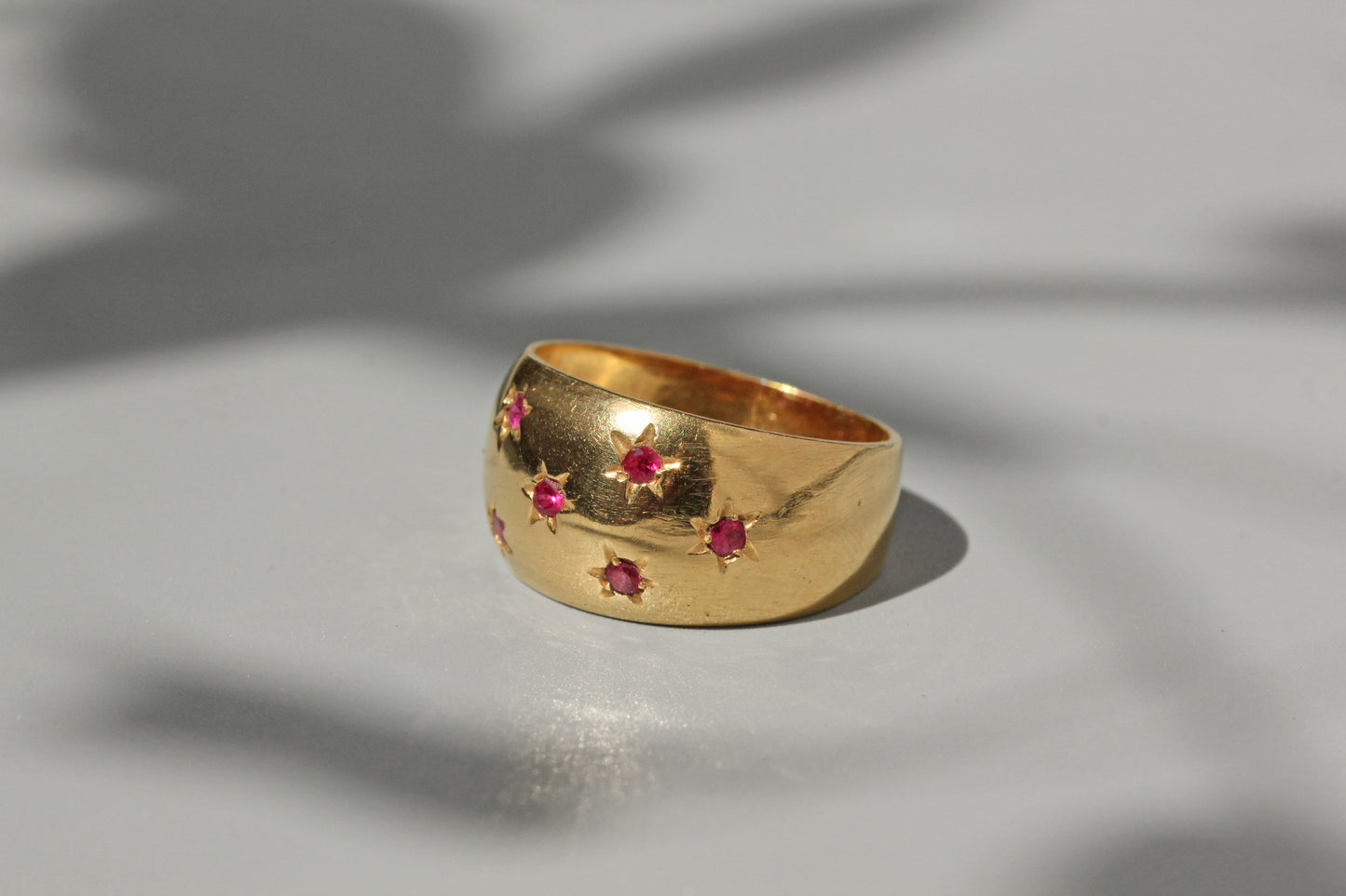Vintage chunky celestial star set ruby ring, in 18 carat gold