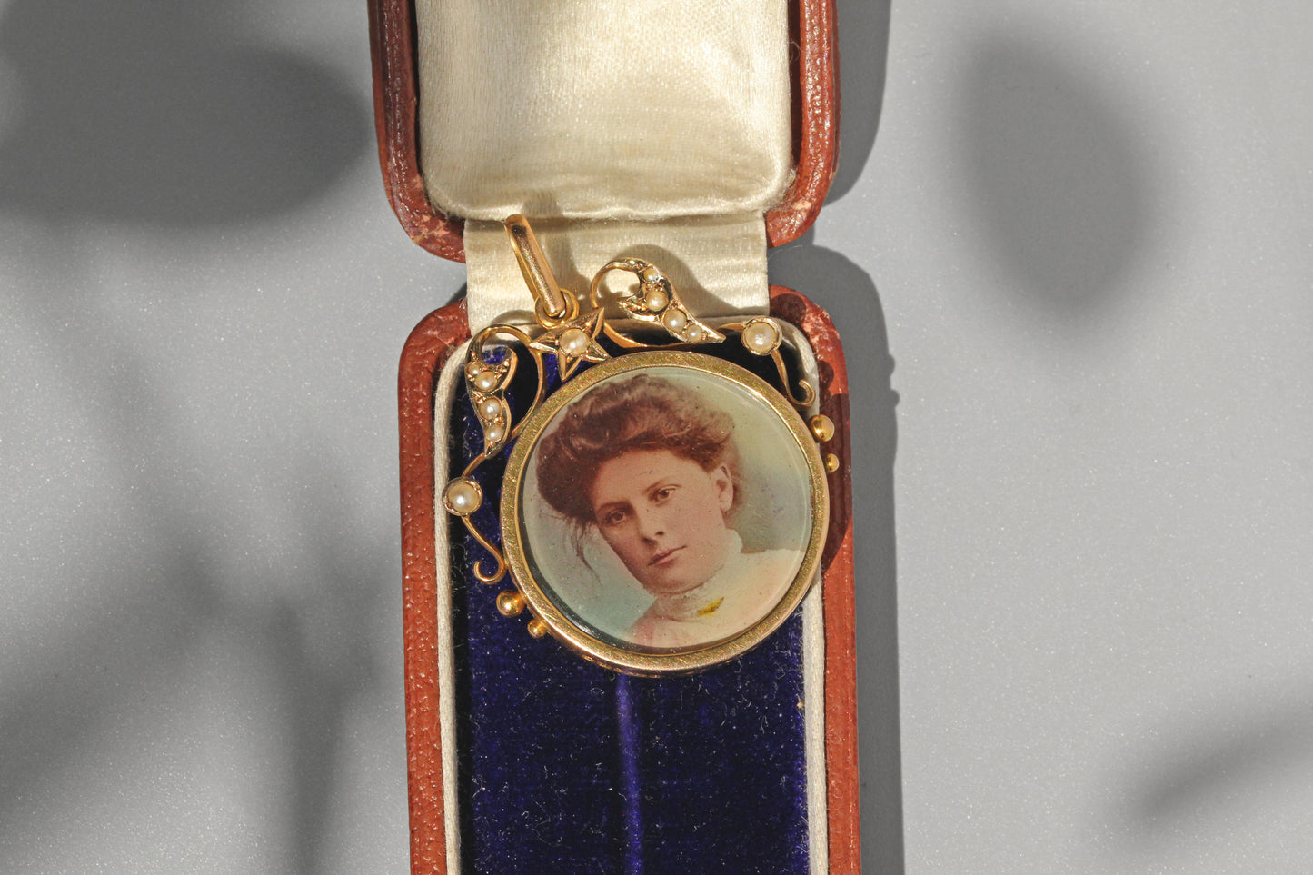 Antique celestial pearl double locket pendant, in 9 carat gold