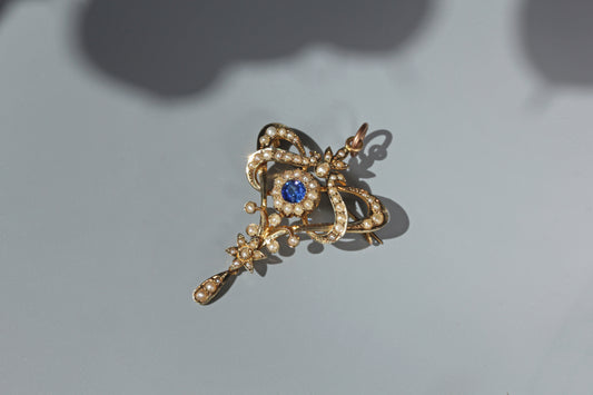 Victorian blue paste and pearl pendant brooch with articulated drop detail in 9 carat gold