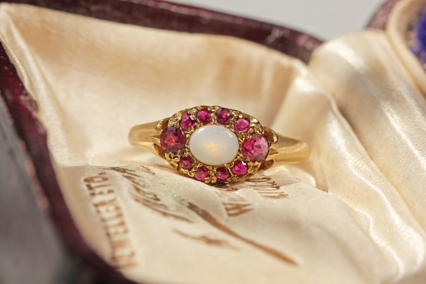 Hallmarked 1978 vintage opal and ruby ring in 9ct gold