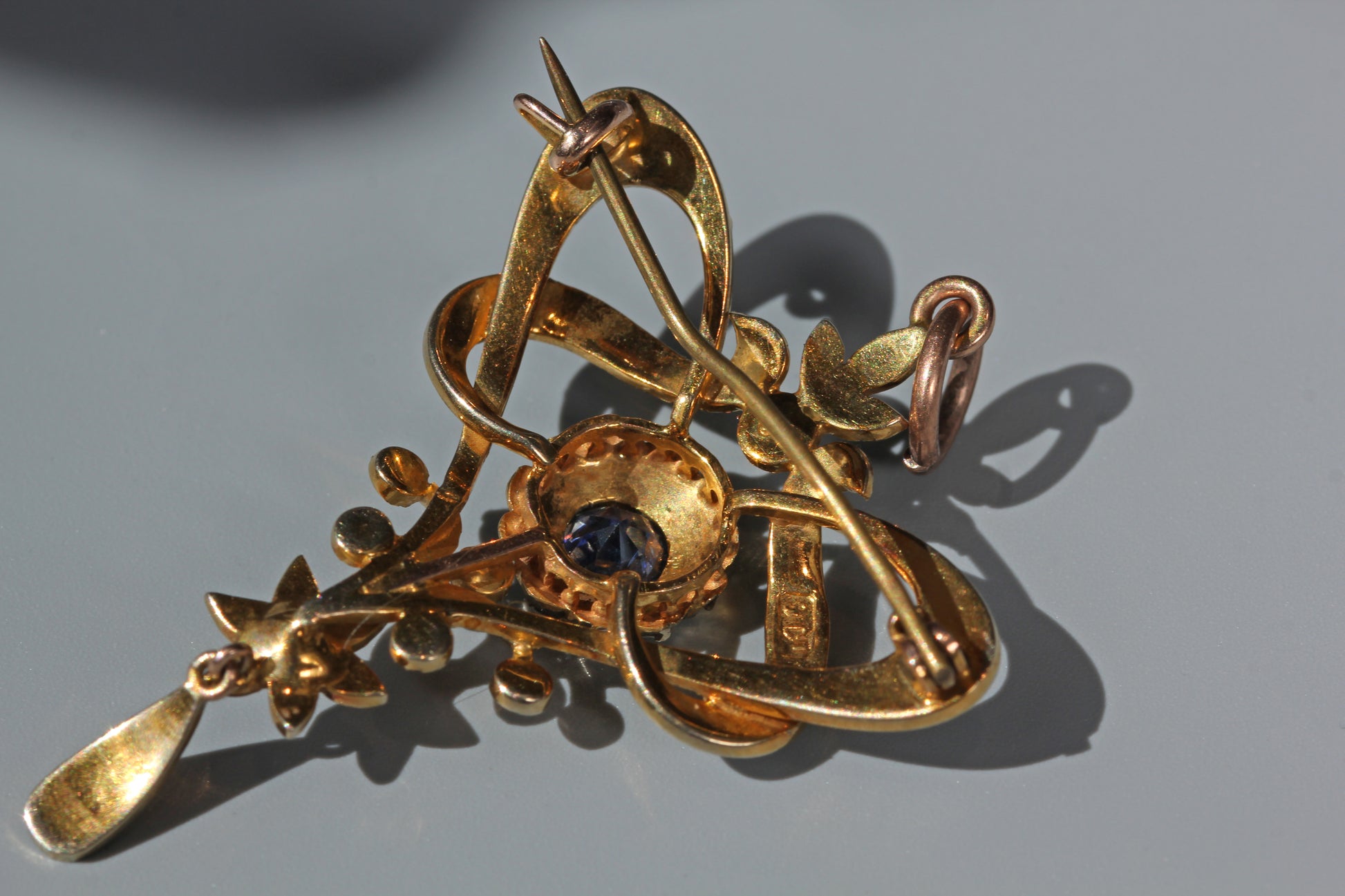Reverse of antique 9 carat gold lavaliere pendant brooch with original pin fitting
