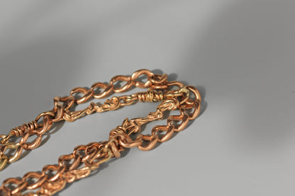 Close up of 9ct gold fancy link on Albert chain bracelet