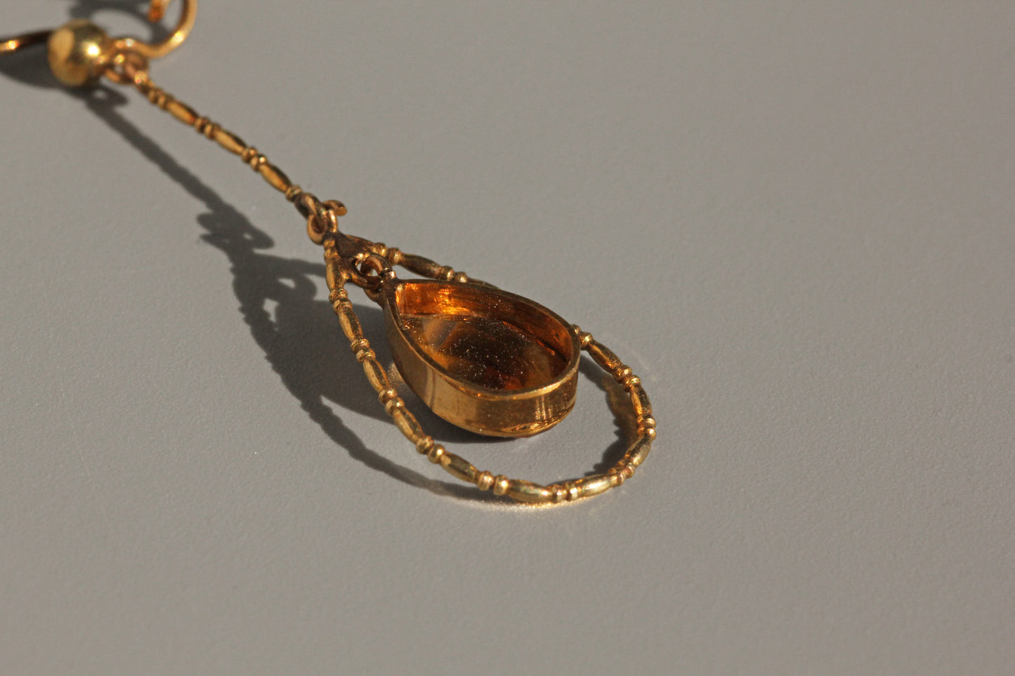 Antique topaz teardrop earrings, in 9 carat gold