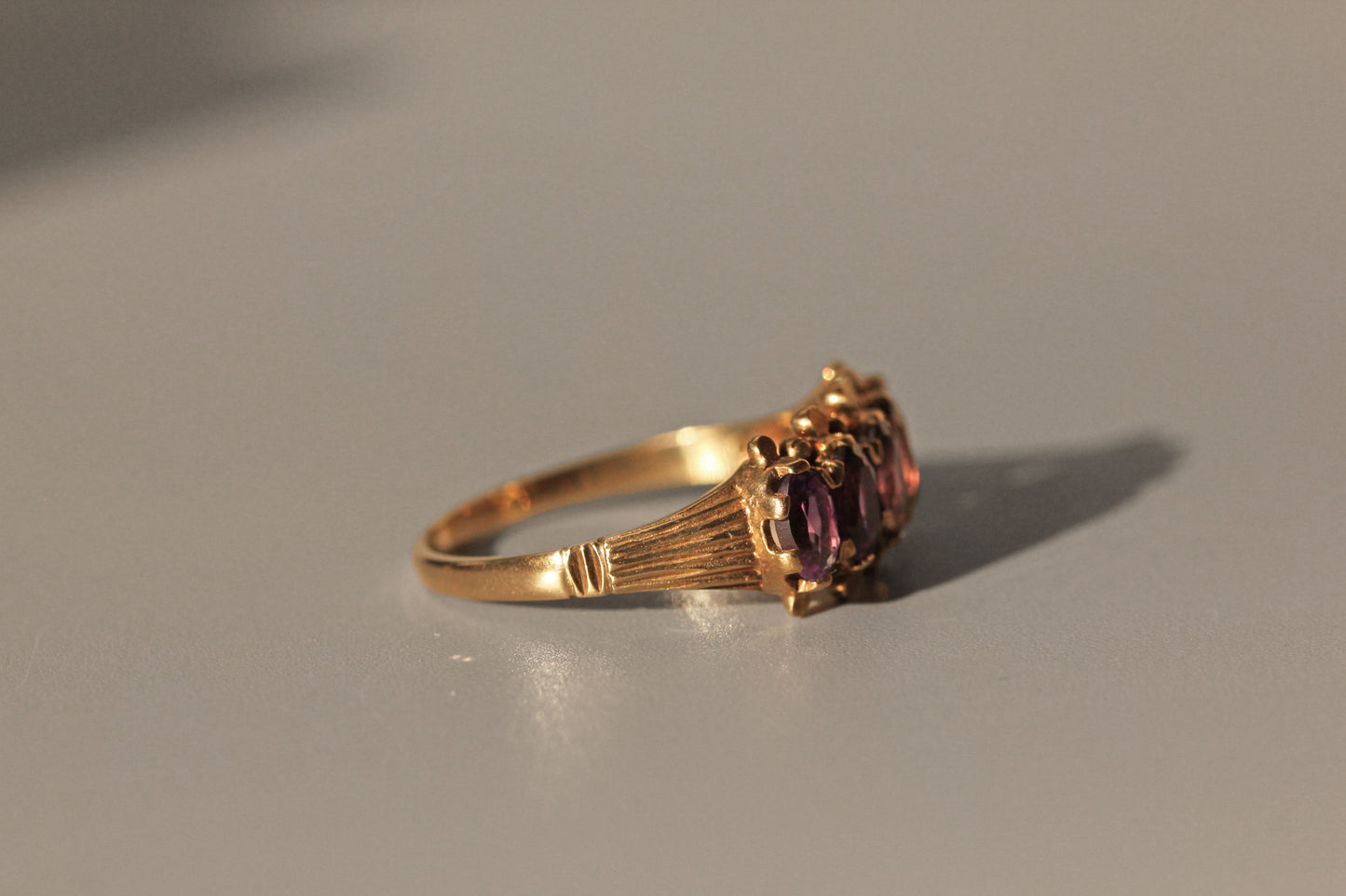 Vintage amethyst five stone ring, in 9 carat gold