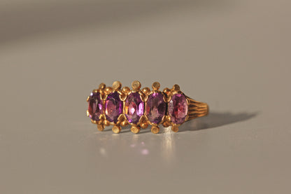 Vintage amethyst five stone ring, in 9 carat gold