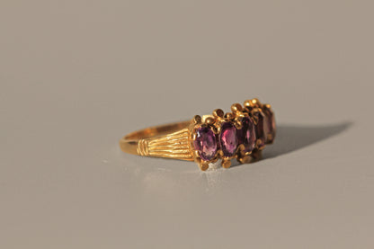 Vintage amethyst five stone ring, in 9 carat gold