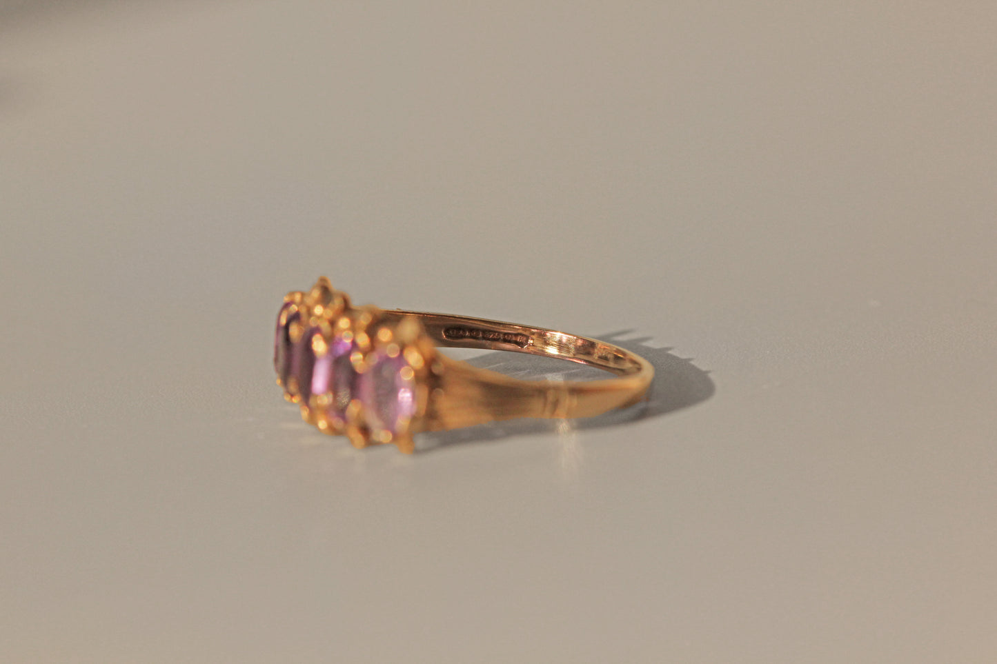 Vintage amethyst five stone ring, in 9 carat gold