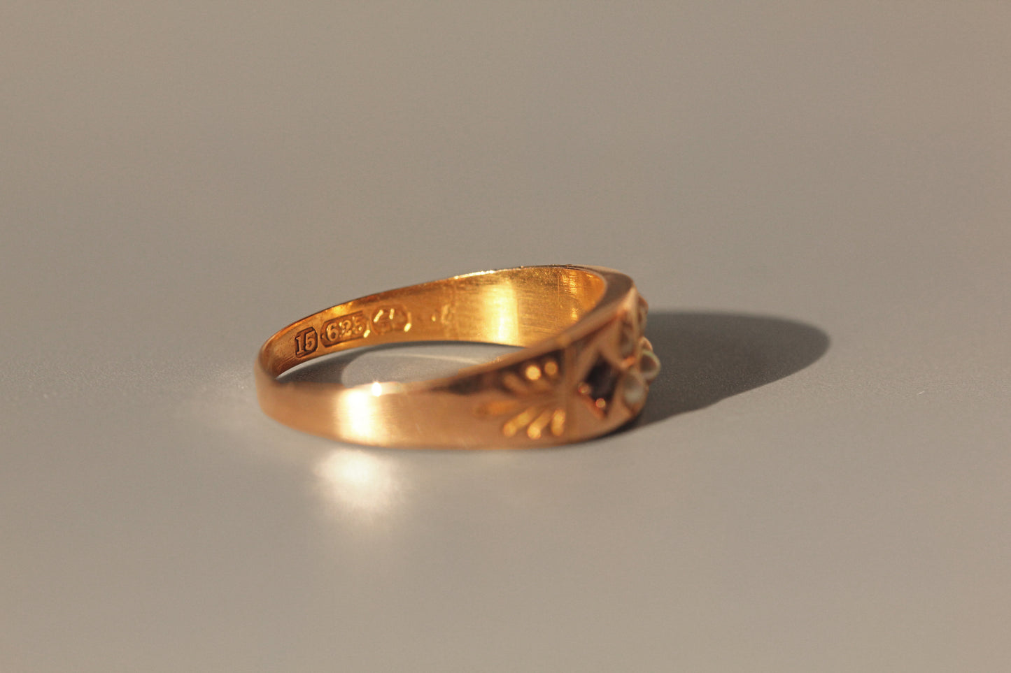 Antique victorian ruby & seed pearl band ring, in 15 carat gold