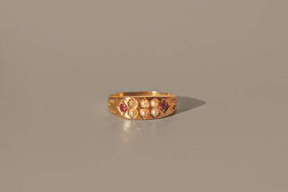 Antique victorian ruby & seed pearl band ring, in 15 carat gold