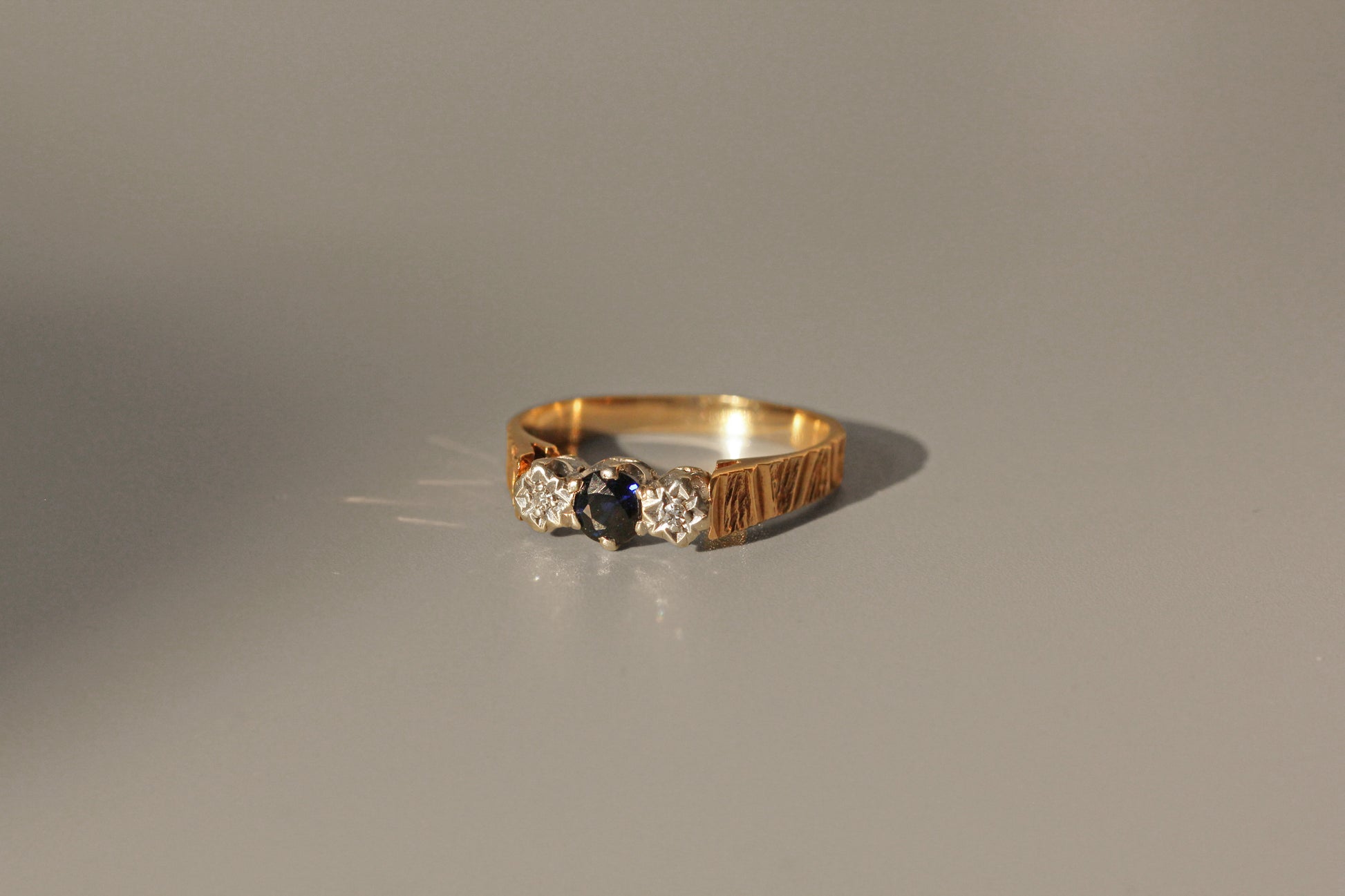 Vintage 1976 sapphire ring with white gold gallery
