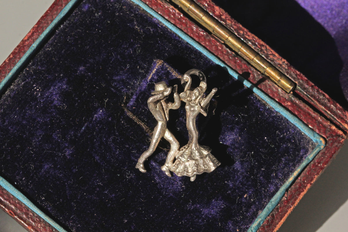 Mid century flamenco dancer souvenir charm in sterling silver in purple velvet box