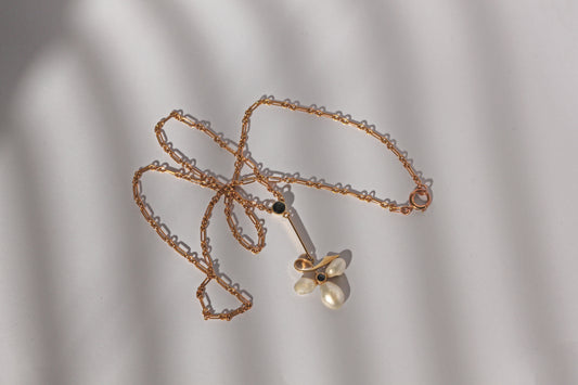 Edwardian 15ct gold necklace with baroque pearl leaf design and sapphire