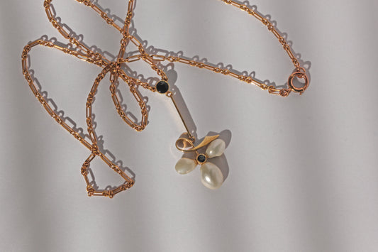 Antique Edwardian sapphire and baroque pearl clover necklace in 15ct gold