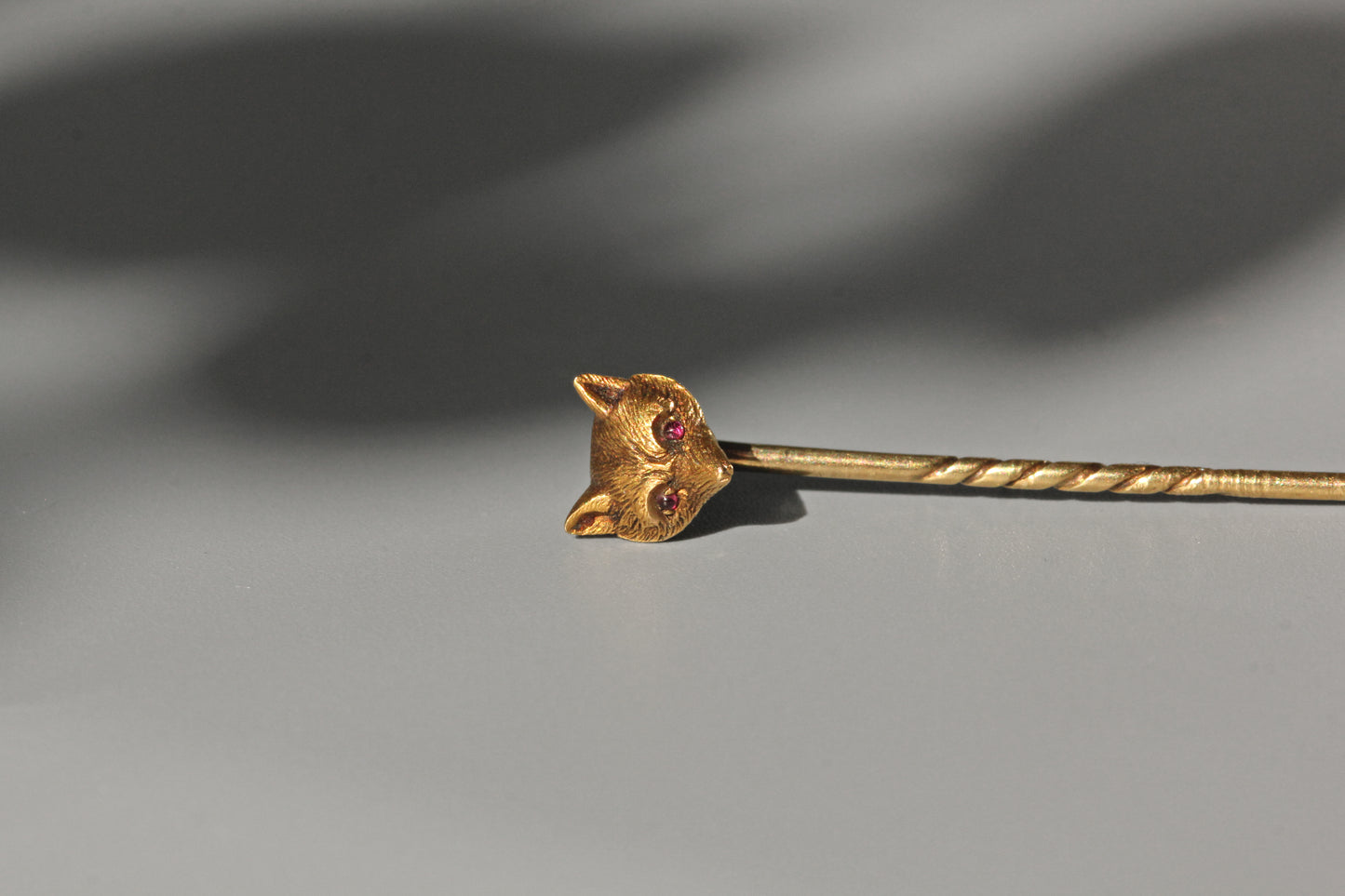Antique victorian fox head pin with pink topaz eyes, in 9 carat gold
