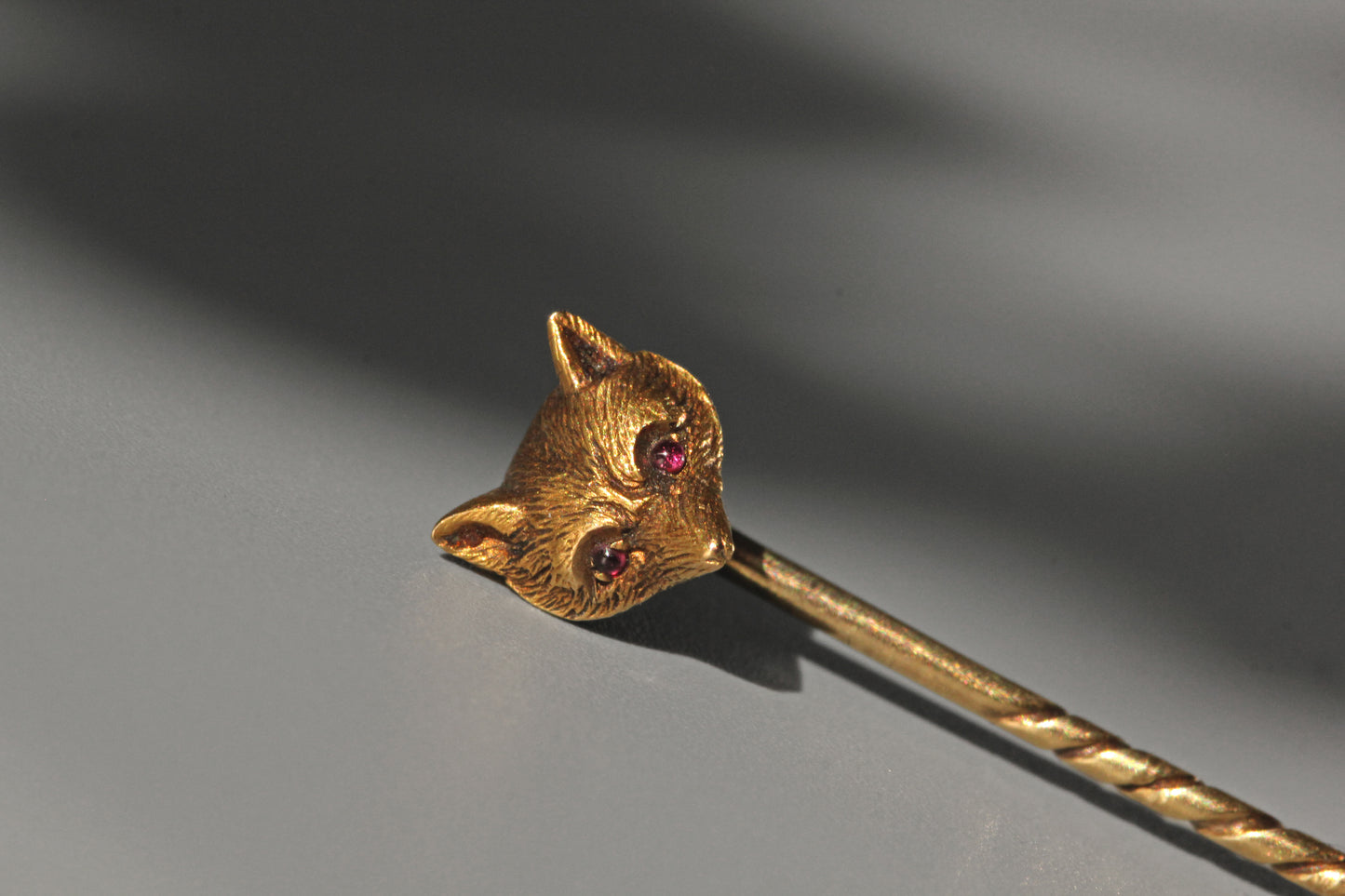 Antique victorian fox head pin with pink topaz eyes, in 9 carat gold