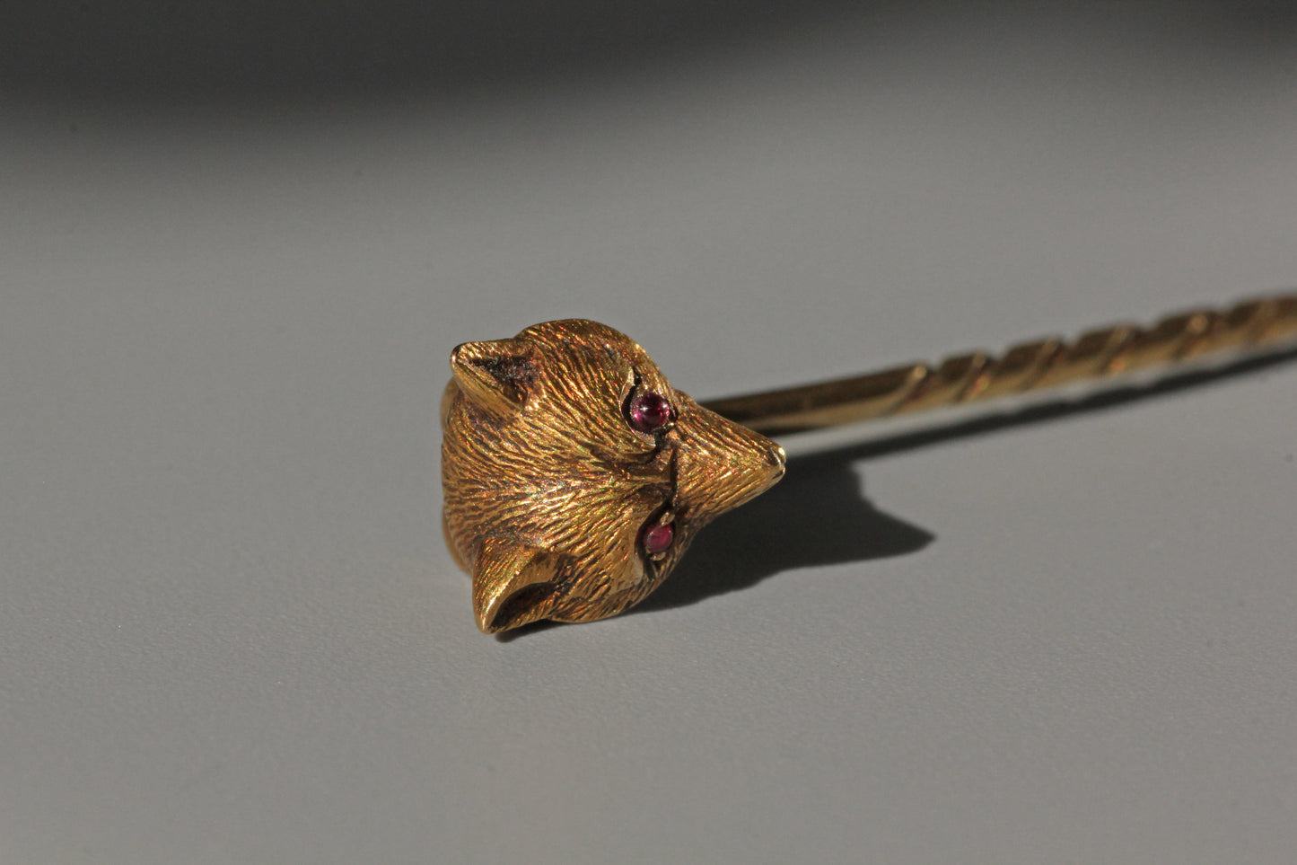 Antique victorian fox head pin with pink topaz eyes, in 9 carat gold