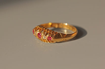 Antique old cut diamond and ruby boat ring, in 18 carat gold