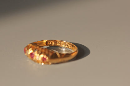 Antique old cut diamond and ruby boat ring, in 18 carat gold