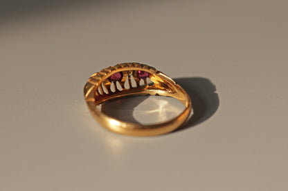 Antique old cut diamond and ruby boat ring, in 18 carat gold