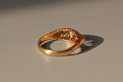 Antique old cut diamond and ruby boat ring, in 18 carat gold