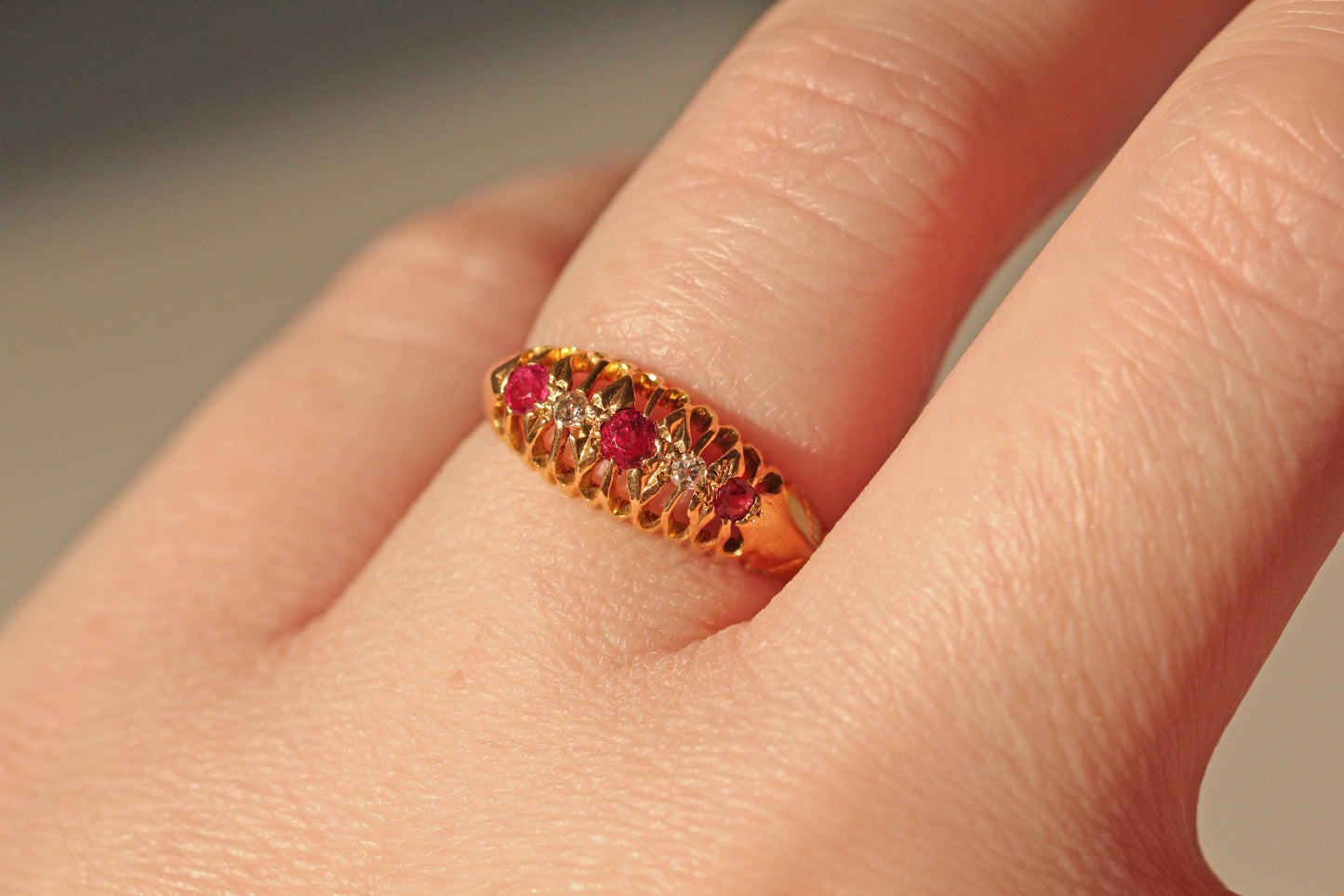 Antique old cut diamond and ruby boat ring, in 18 carat gold