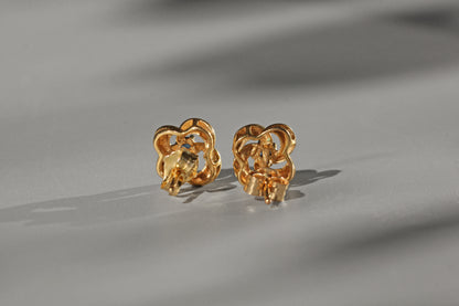 Vintage sapphire love knot stud earrings, in 9 carat gold