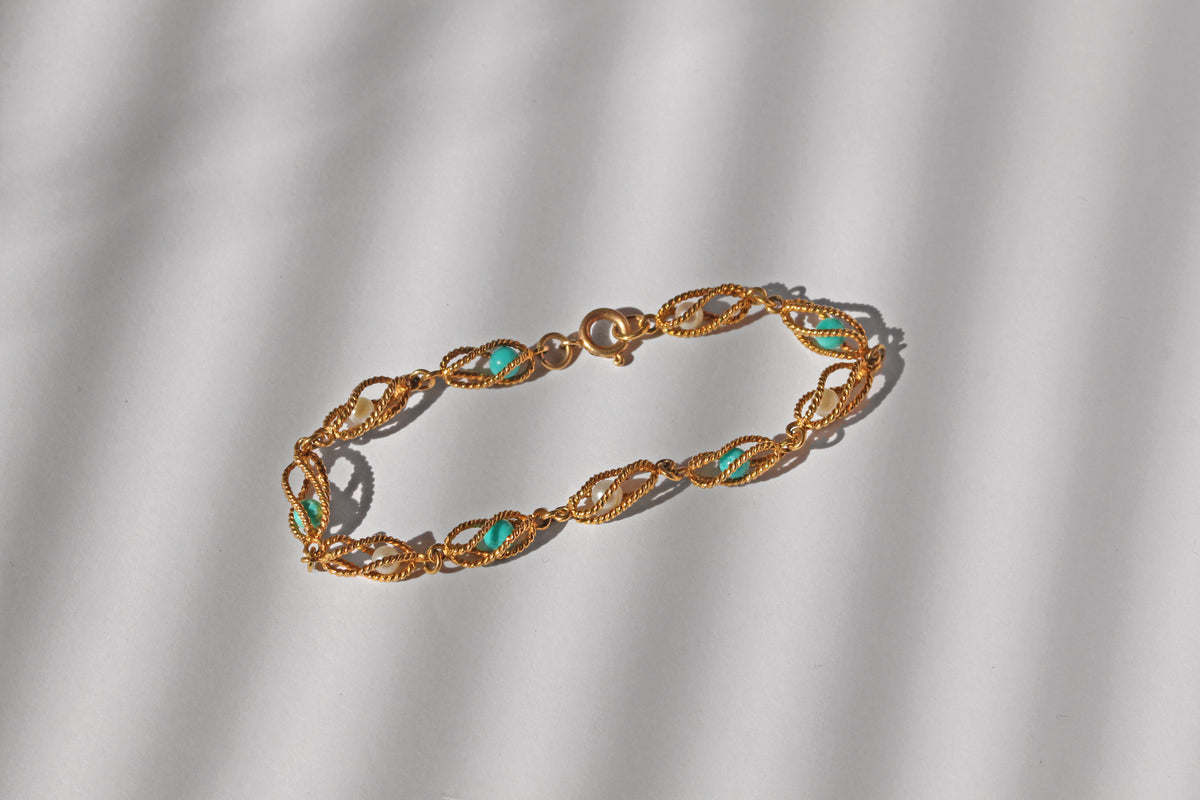 Ornate vintage gold bracelet with alternating pearls and amazonite
