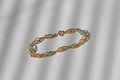 Ornate vintage gold bracelet with alternating pearls and amazonite
