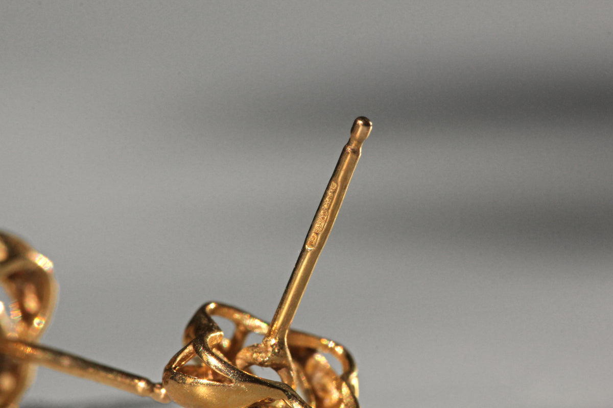 Vintage sapphire love knot stud earrings in 9 carat gold hallmarked stem