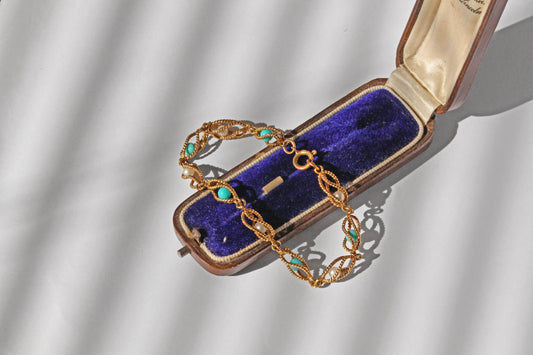 Twisted wirework gold bracelet with pearls and amazonite cabochons

