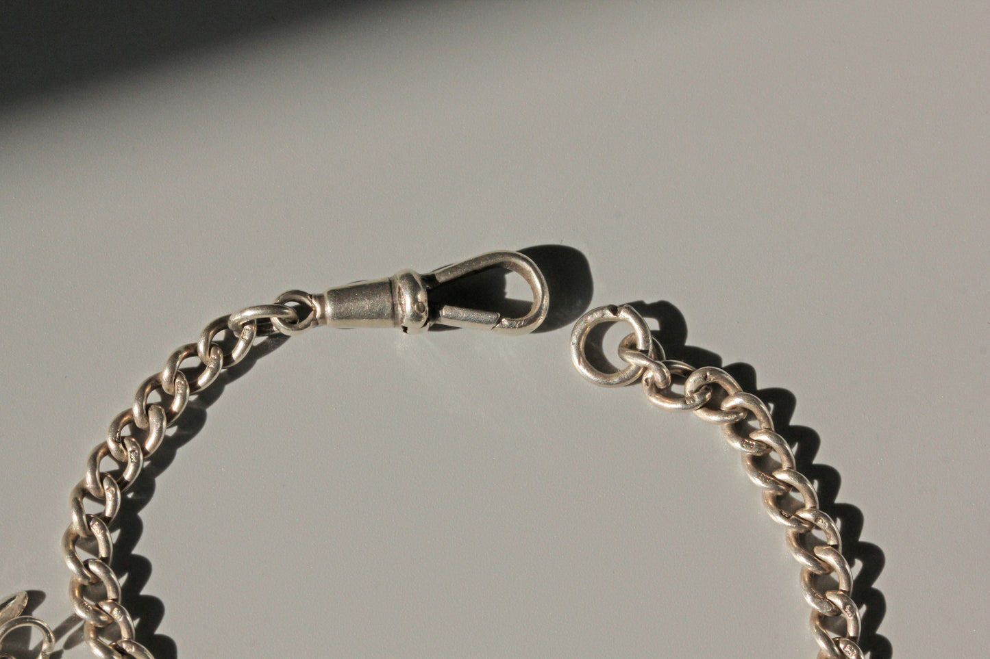 Antique albert chain charm bracelet, in sterling silver