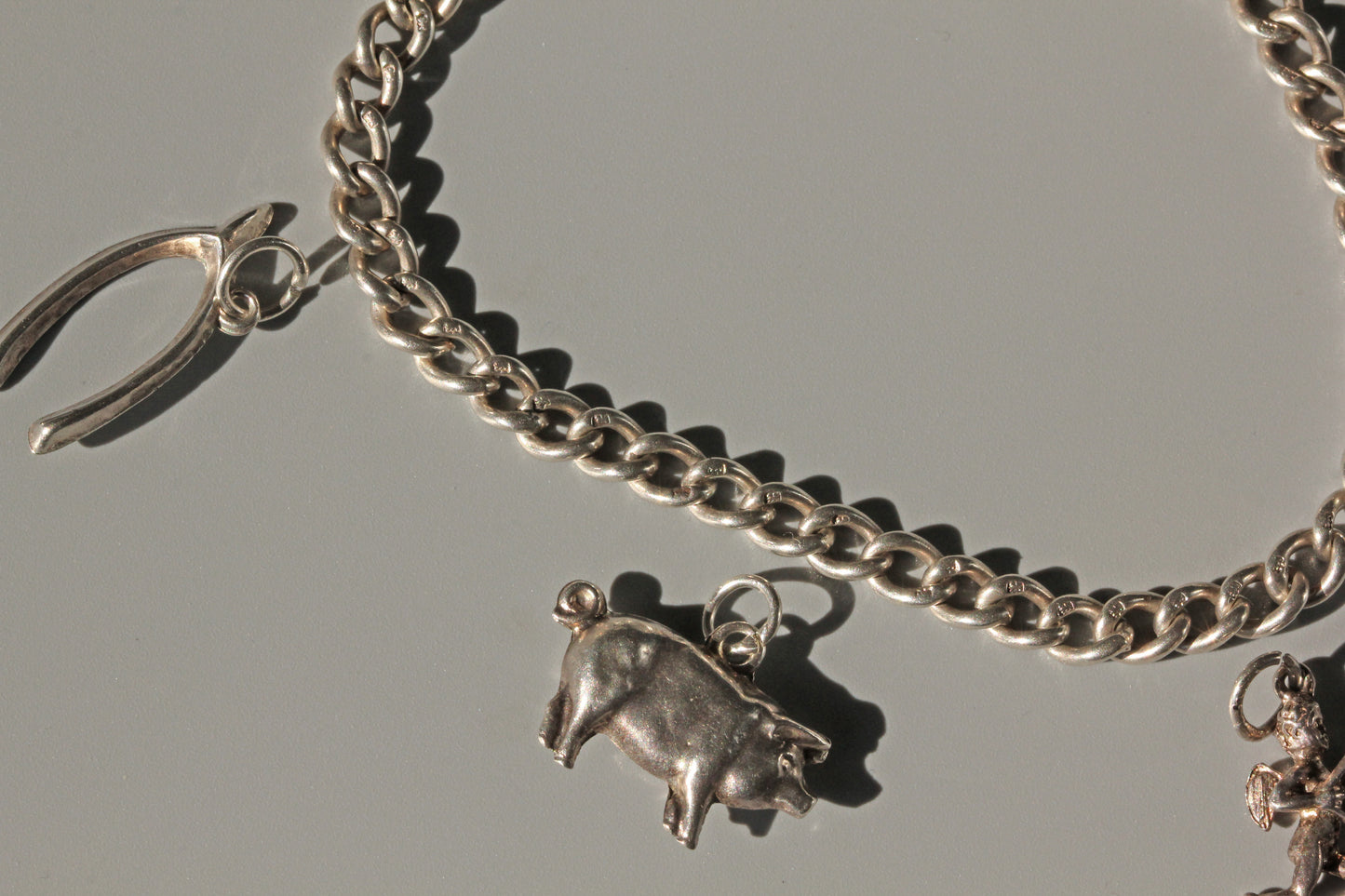 Antique albert chain charm bracelet, in sterling silver