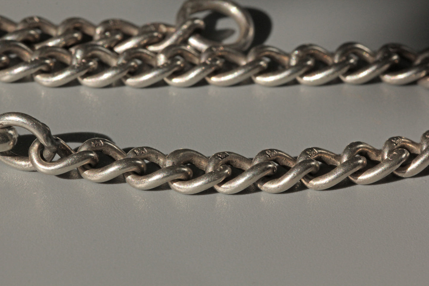Antique albert chain charm bracelet, in sterling silver