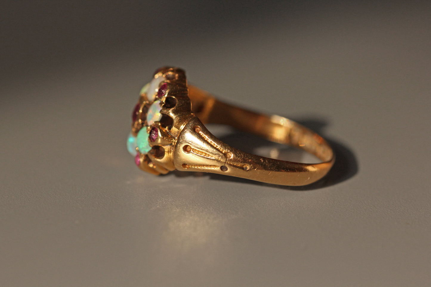 Antique Victorian opal and amethyst celestial cluster ring in 18ct gold side profile