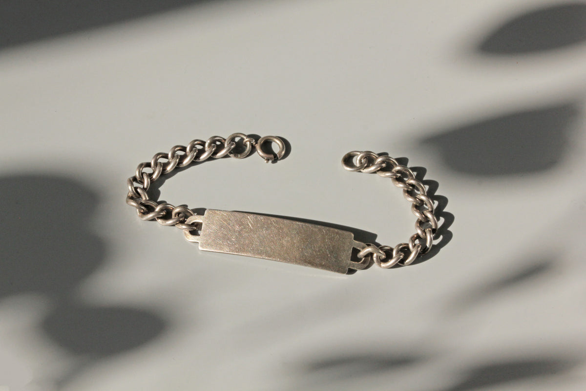 Vintage chunky curb link identity bracelet in sterling silver opened